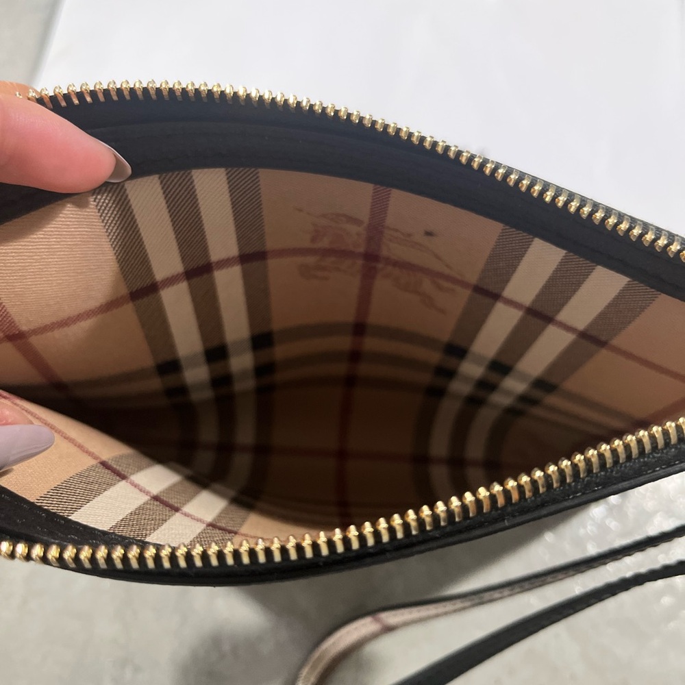 Black Burberry wristlet. Gently used